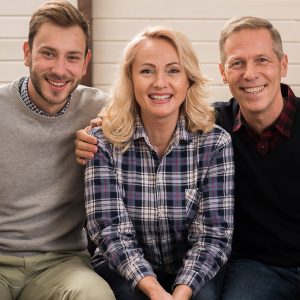 A couple posing for a picture as part of their Family-Based Green Card application.